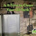 two oil tanks in a basement of a home in Levittown, PA, in need of oil tank cleaning services